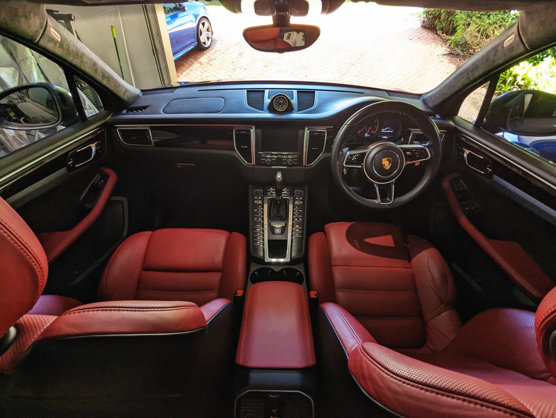 The Bordeaux Red interior seems to be a rare choice. Many choose a bright red. I think this is much more classy.