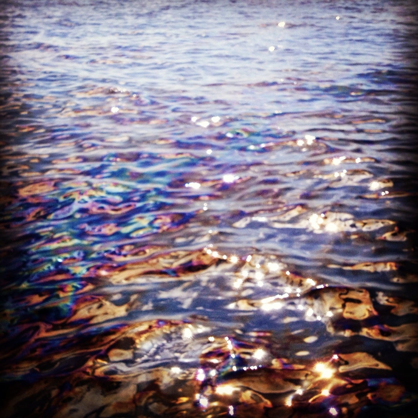 Surface sheen above a natural oil seep in the Gulf of Mexico. Photo by Beth Orcutt.