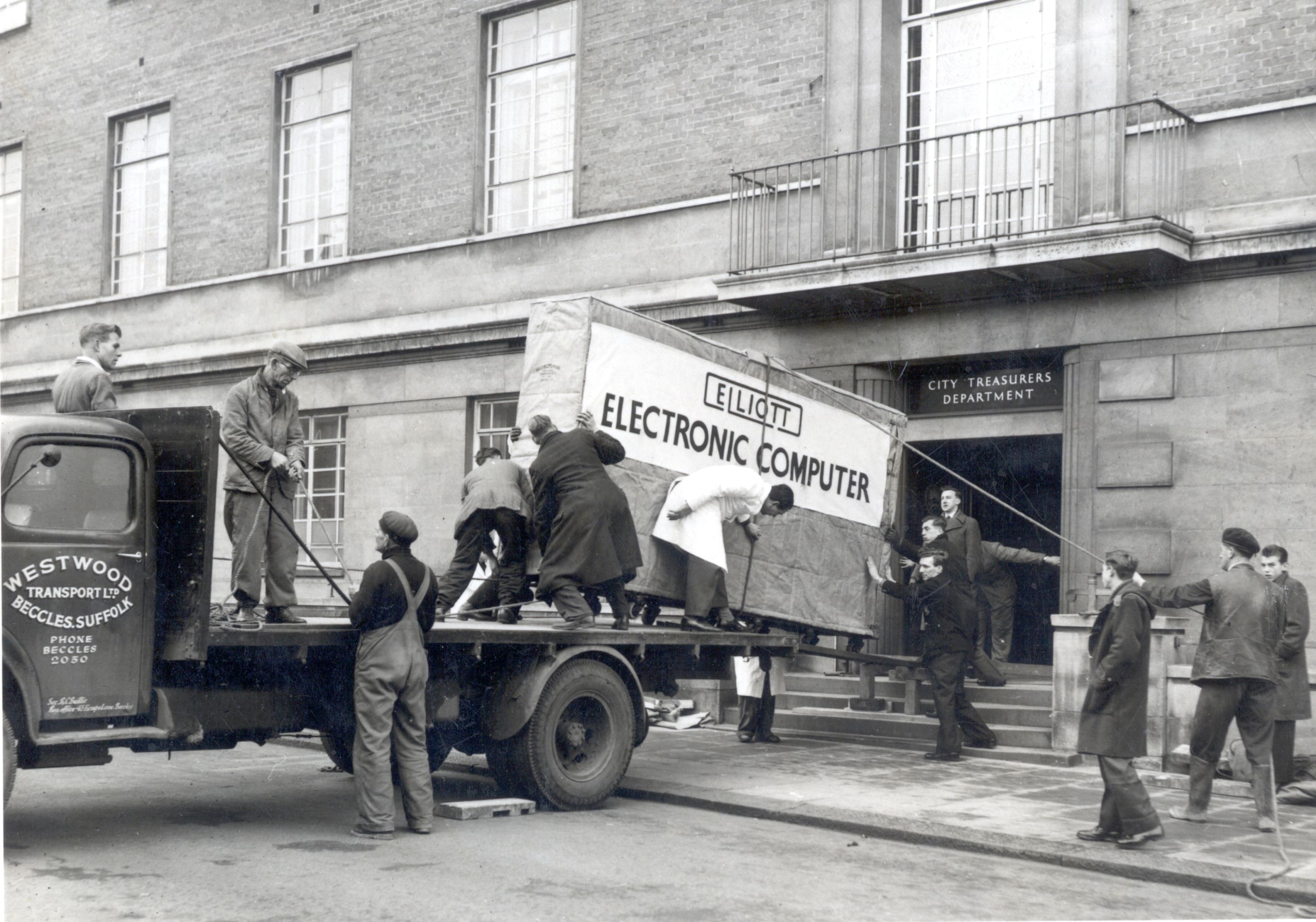 Photograph of Norwich City Council’s first computer being delivered to the City Treasurer’s Department in Bethel Street, Norwich, 1957. Norfolk Record Office: ACC 2005/170 (facsimile)