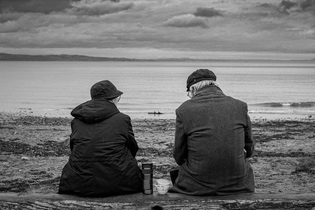 Old couple on the beach