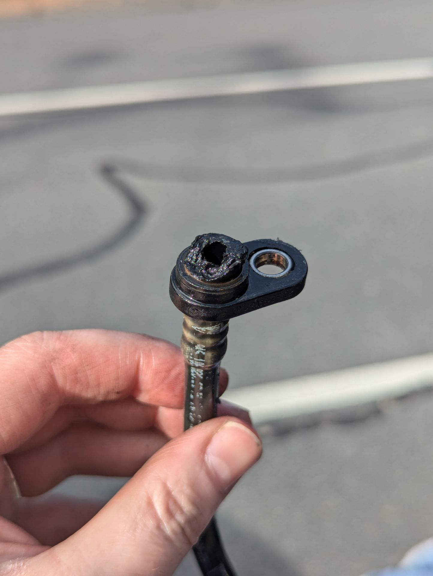 One of the plastic fixture removed. Note the rough edge.