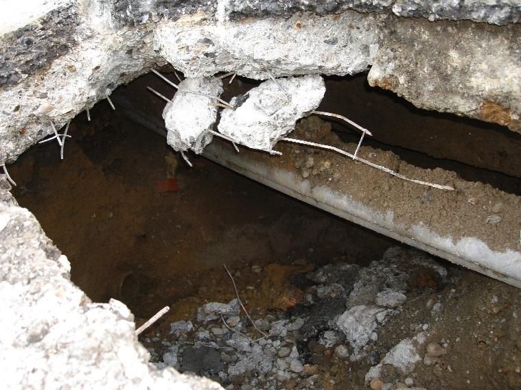 C:\Users\Janine\Dropbox\HNF Plan\Evidence Base to accompany Plan\Basement evidence\Sink Holes\Large hole under Heath Street from ground water erosion outside the Baptist church 1.jpg