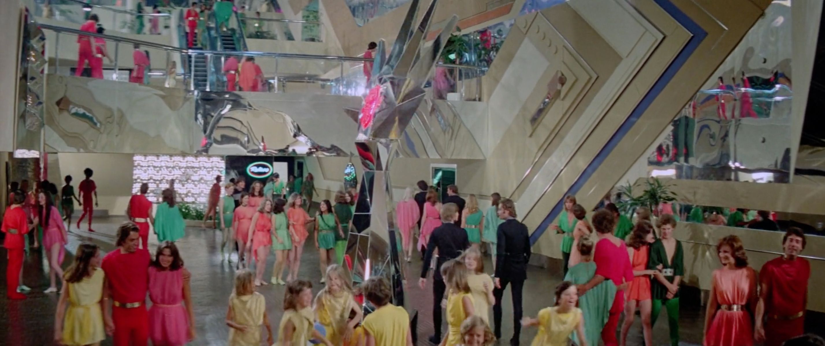 Finally, a shout-out to the production design (except for Box), which is somehow both frozen-in-amber dated and timeless. Portraying a dystopia as a giant mall was pretty damn prescient.