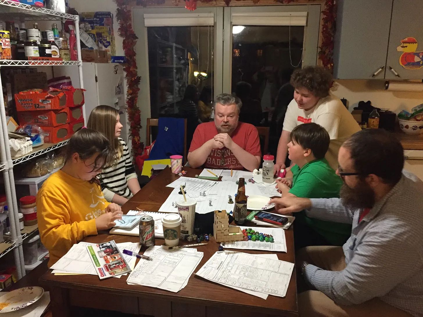 That’s me DMing, and Graciella-Sawyer in green. I had to zoom in to figure out what was happening here: we were onboarding two new players (my daughter and Graciella-Sawyer’s sister) by introducing their characters having been chased up a tree by four ogres. (Photo: Dia Caulkins)