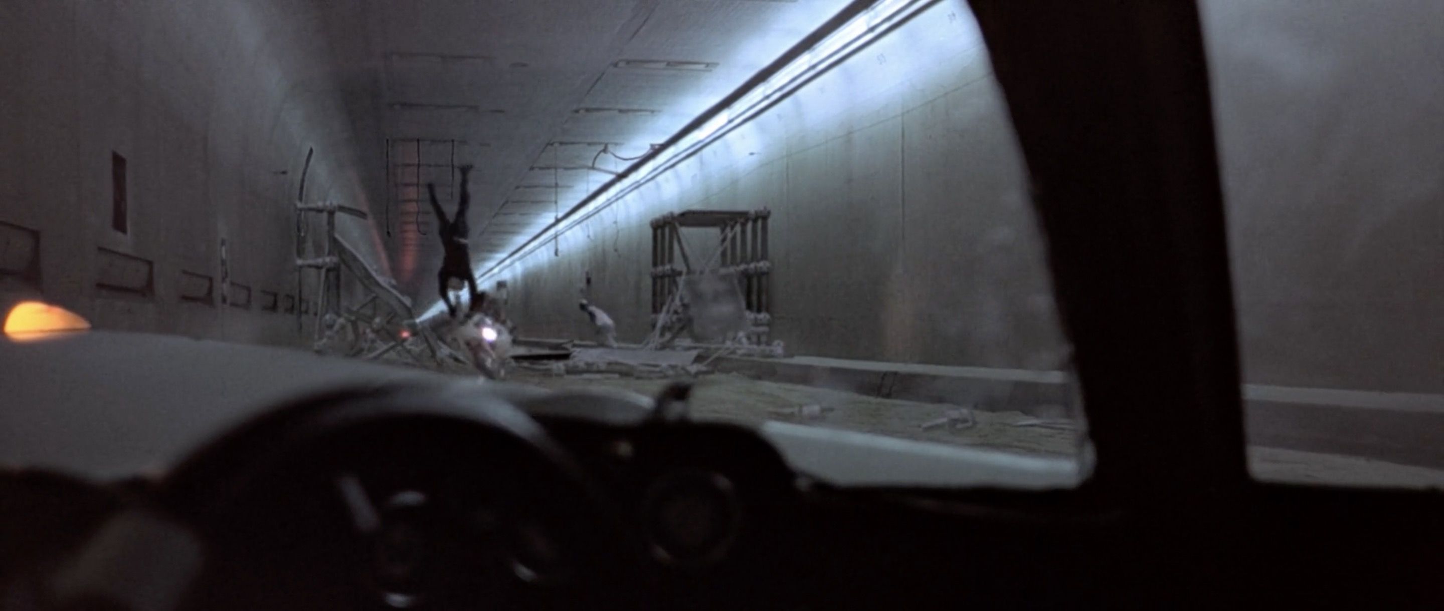 A crazy-ass stunt that somehow didn’t harm the stunt man. (Watch it and you won’t believe that.)