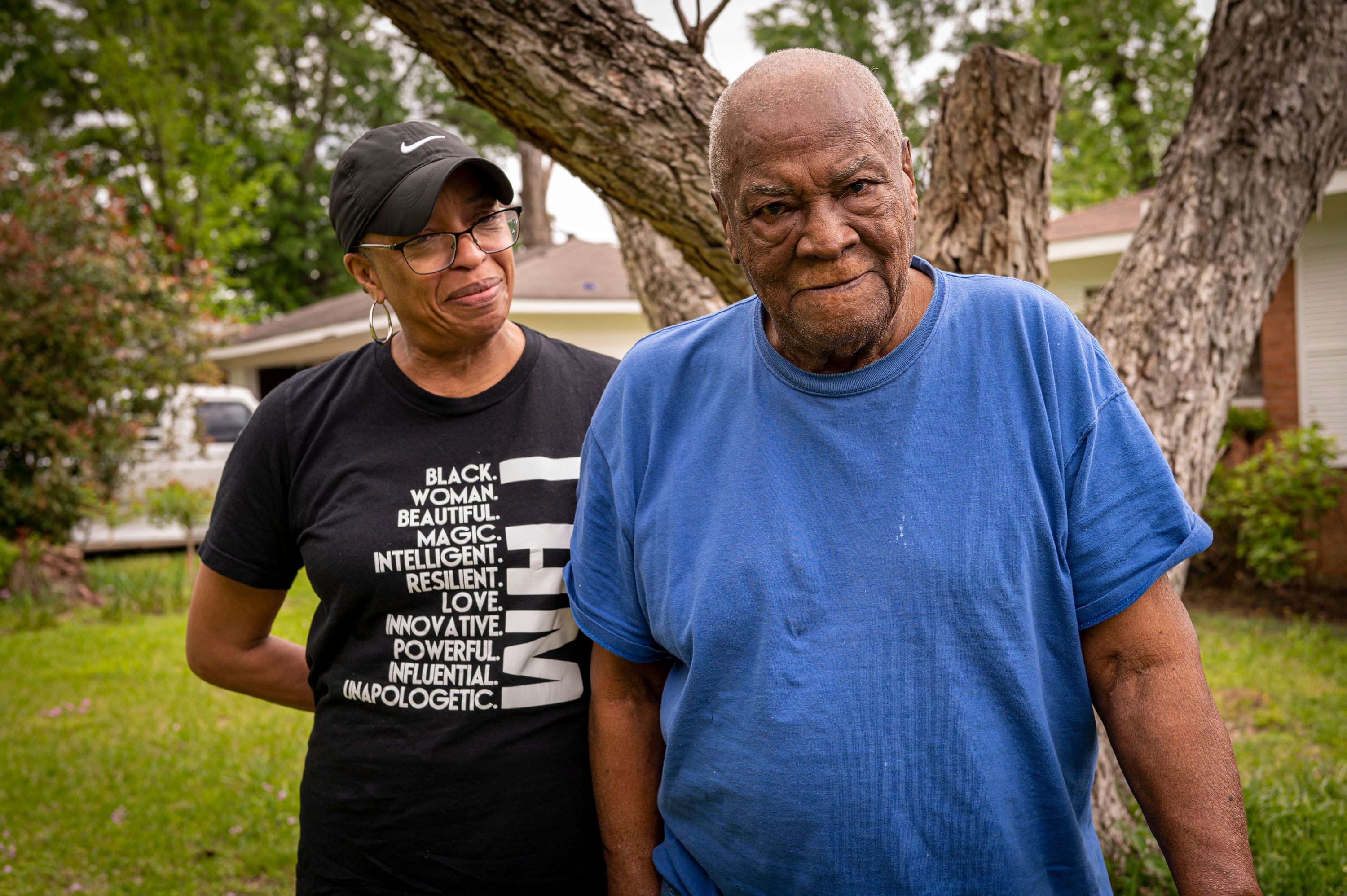 Emzie Wilder and his daughter Shedonna Wilder-Martin stand outside his home in Shreveport, Louisiana. Photo by Ben Greenberg.