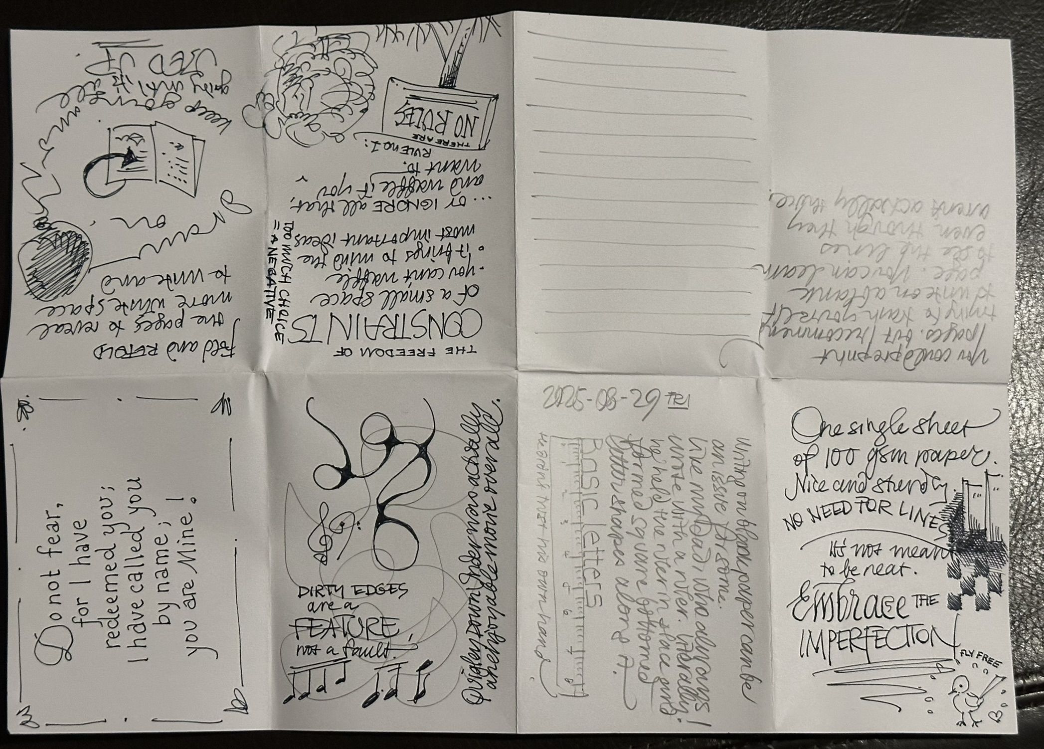 A4 piece of white paper that has been folded into 8 equal segments. Segments have pencil or ink markings and writing on them.