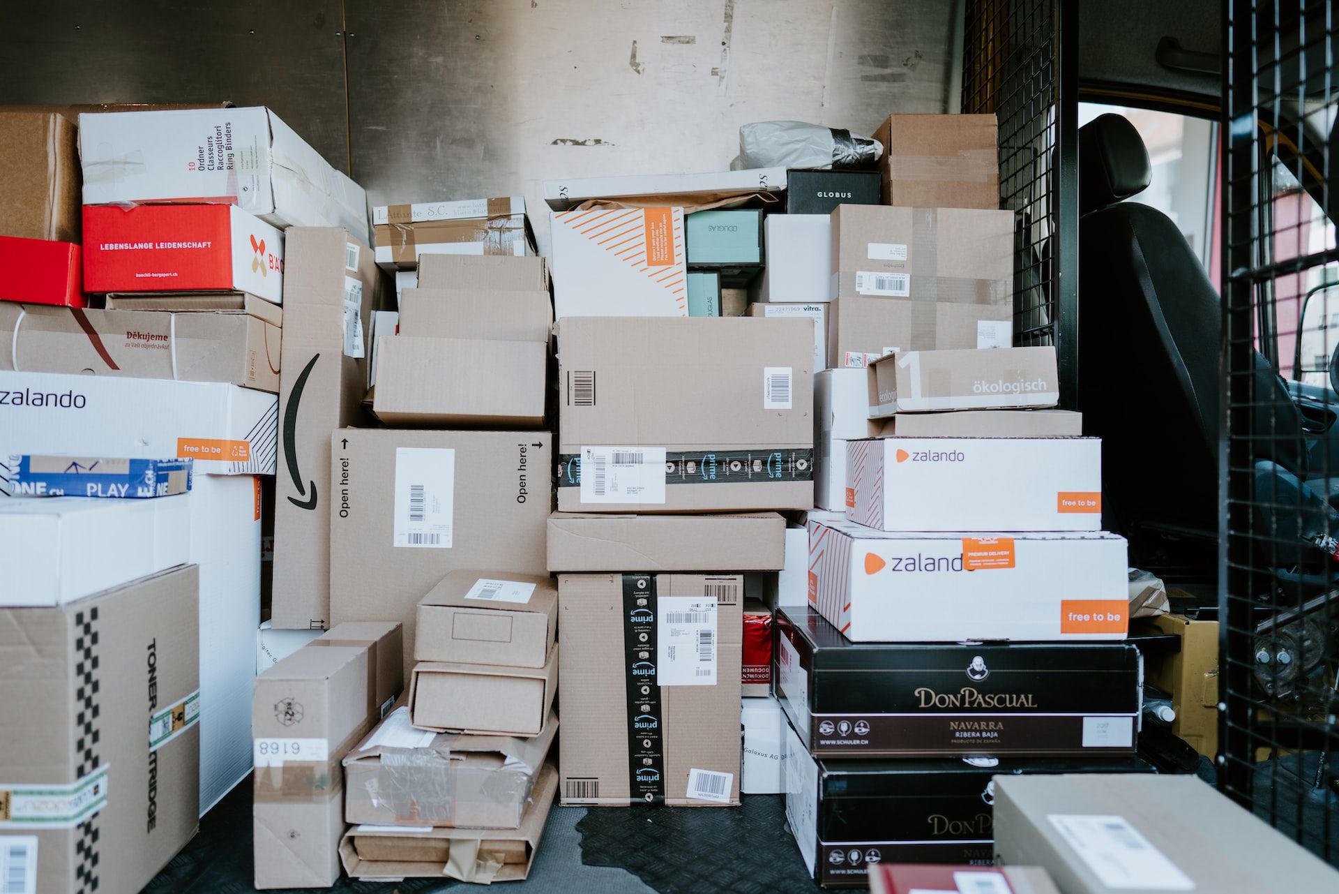 Packages piled up inside a delivery truck