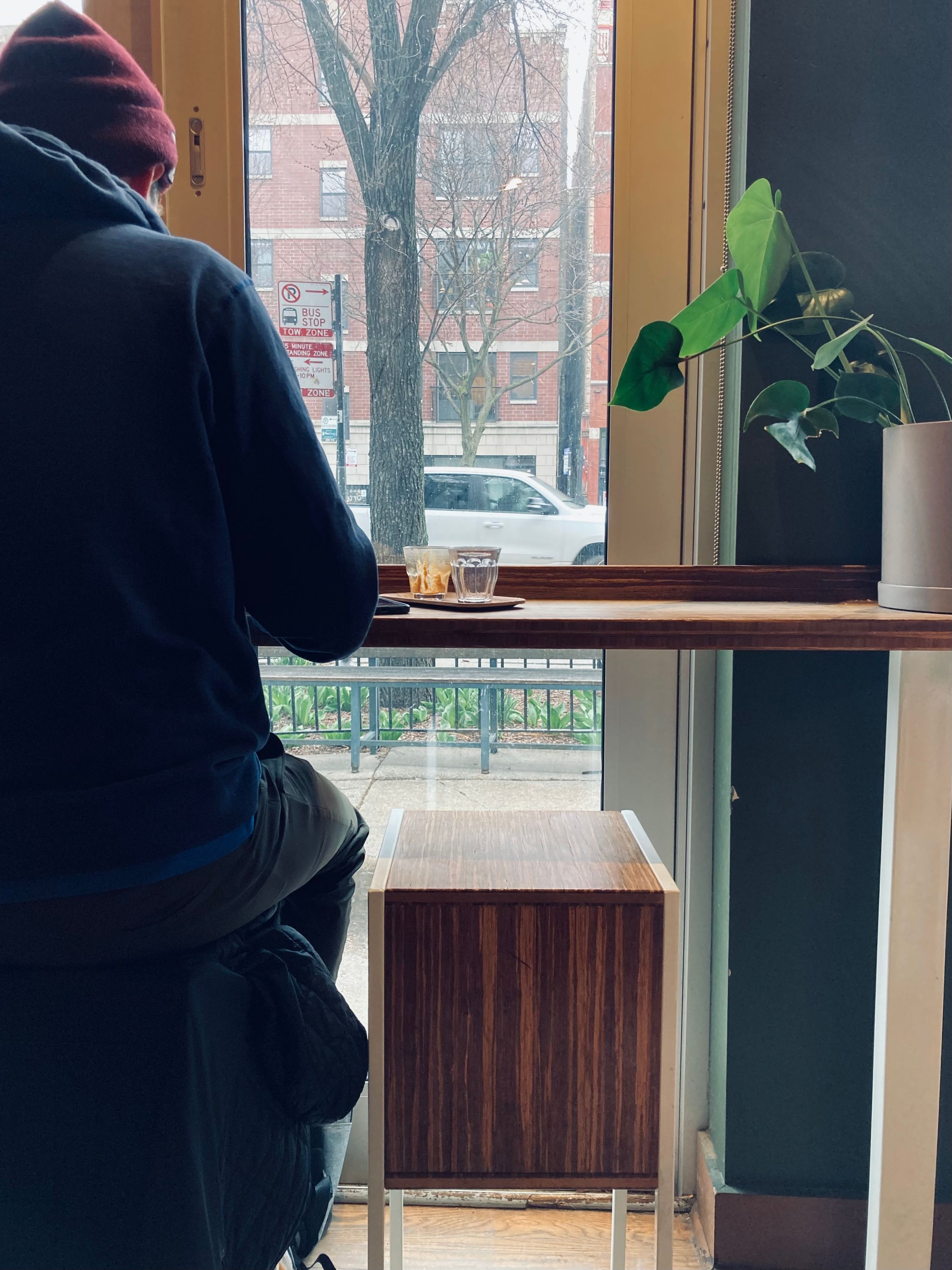 Young man studying at a coffee shop