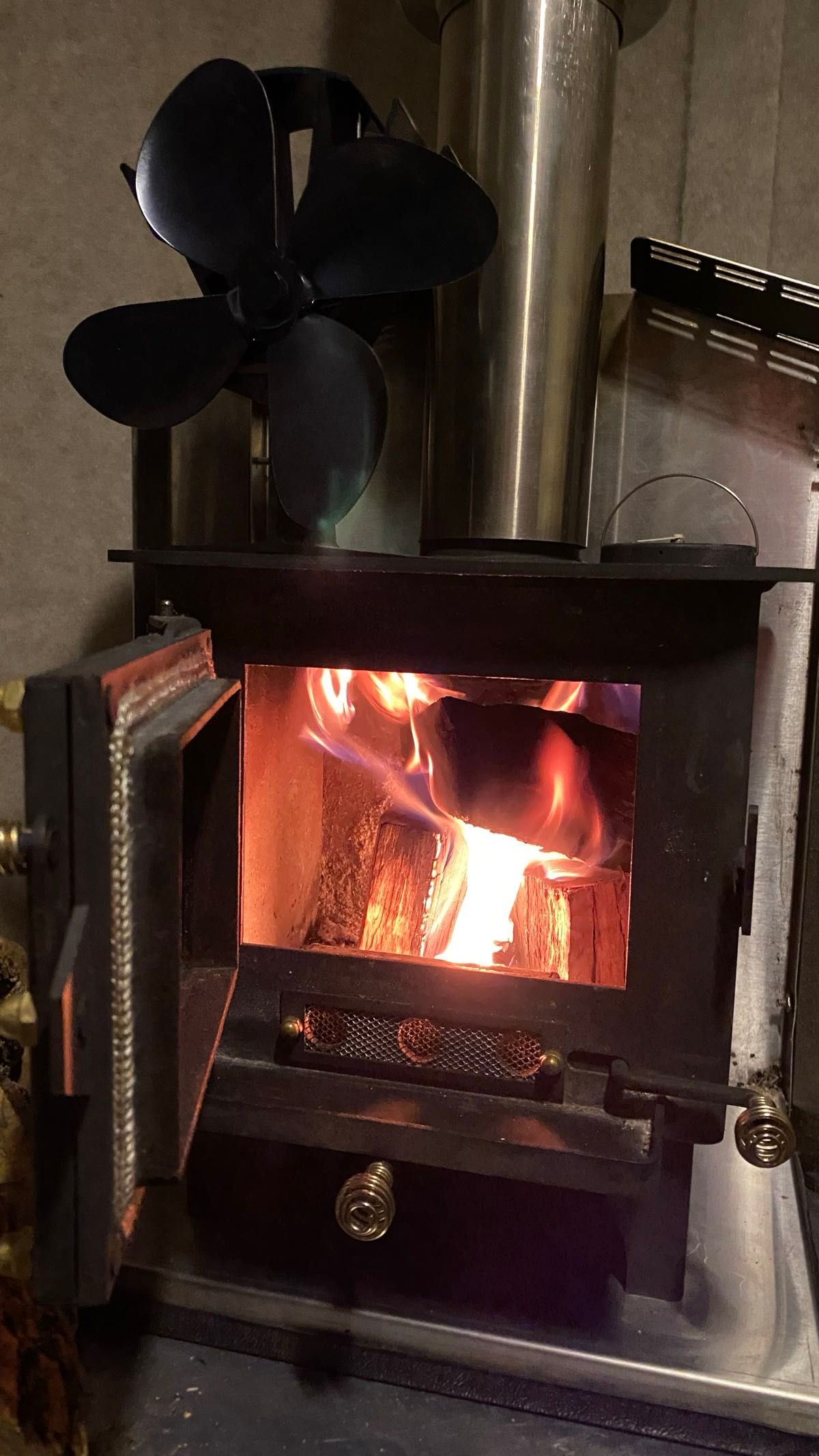 Very grateful for a wood burning stove in camper on a cold, wet and windy night.