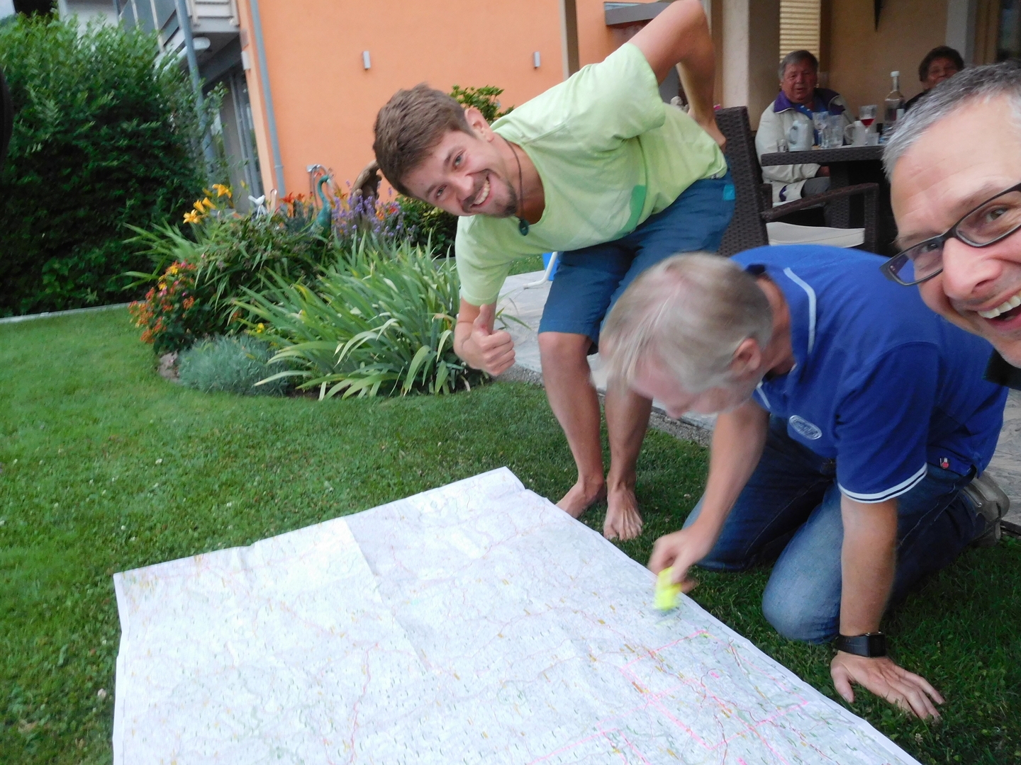 20:56:47: David and Gert sketch out a route to Slovenia. Karl Sr. and Else look on in the background.