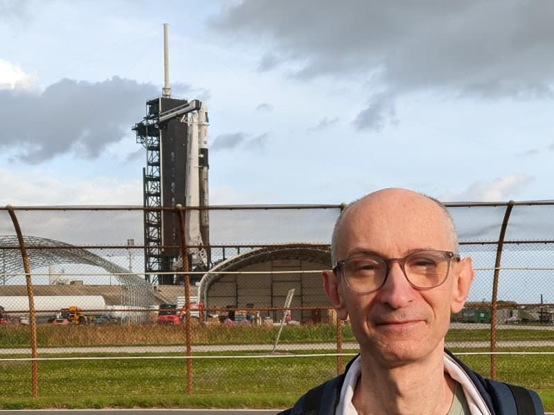 Paolo Amoroso at pad 39A of Kennedy Space Center with the Crew-4 Falcon 9 rocket in the background