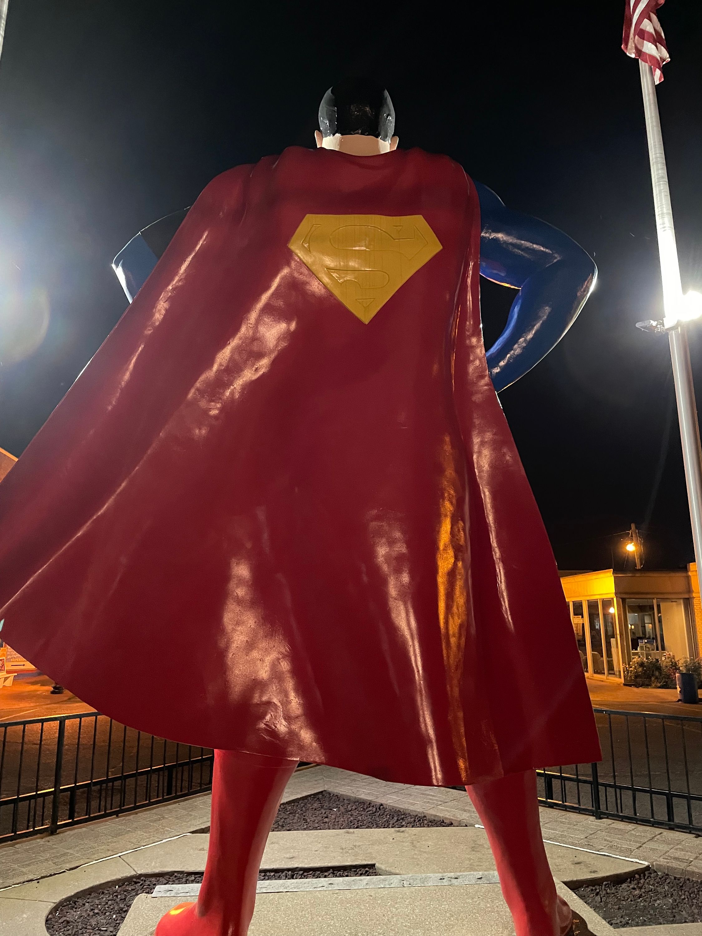 The giant Superman Statue at night