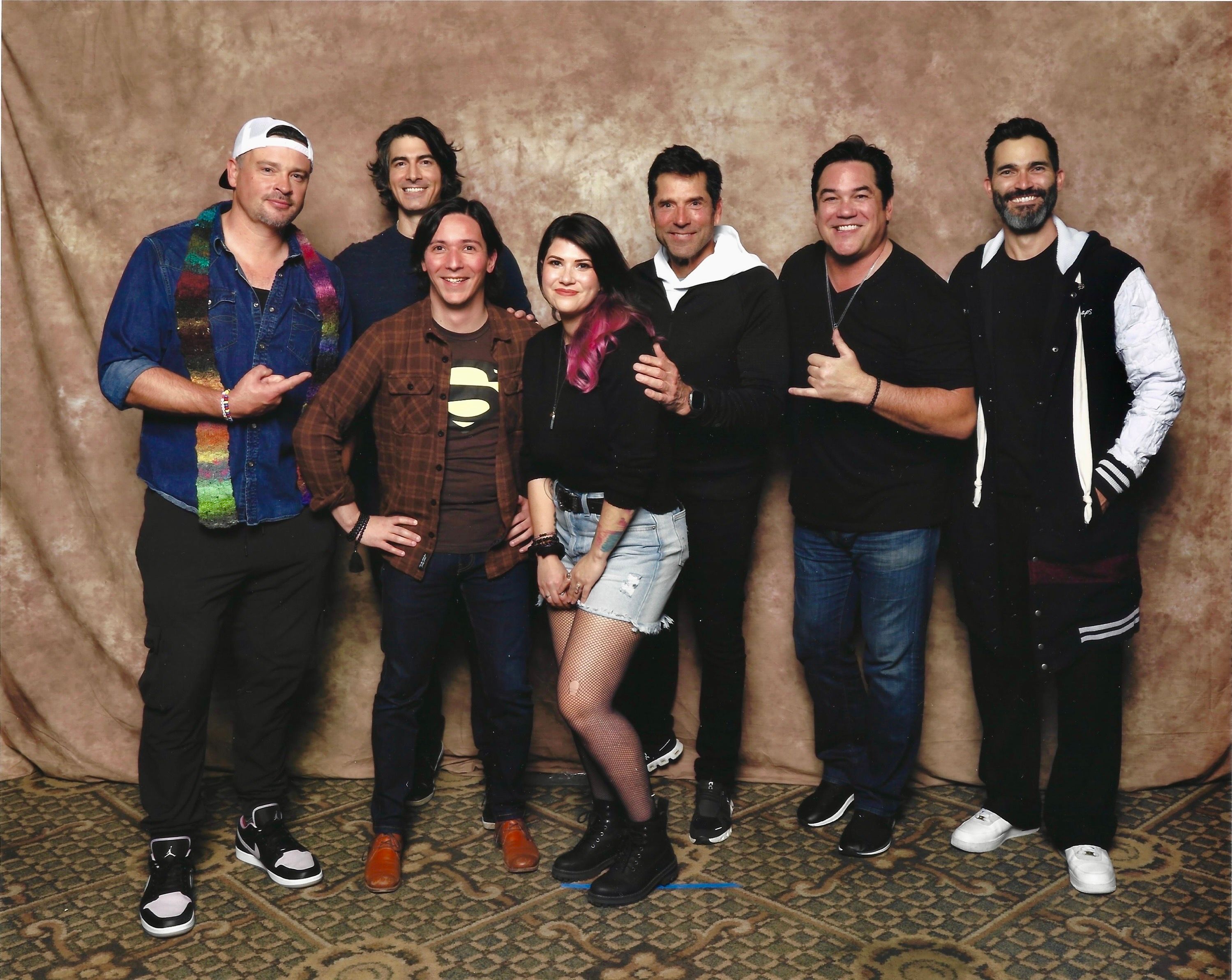 Photo with my girlfriend and I posing with Supermen Tom Welling, Brandon Routh, Gerard Christopher, Dean Cain, and Tyler Hoechlin.