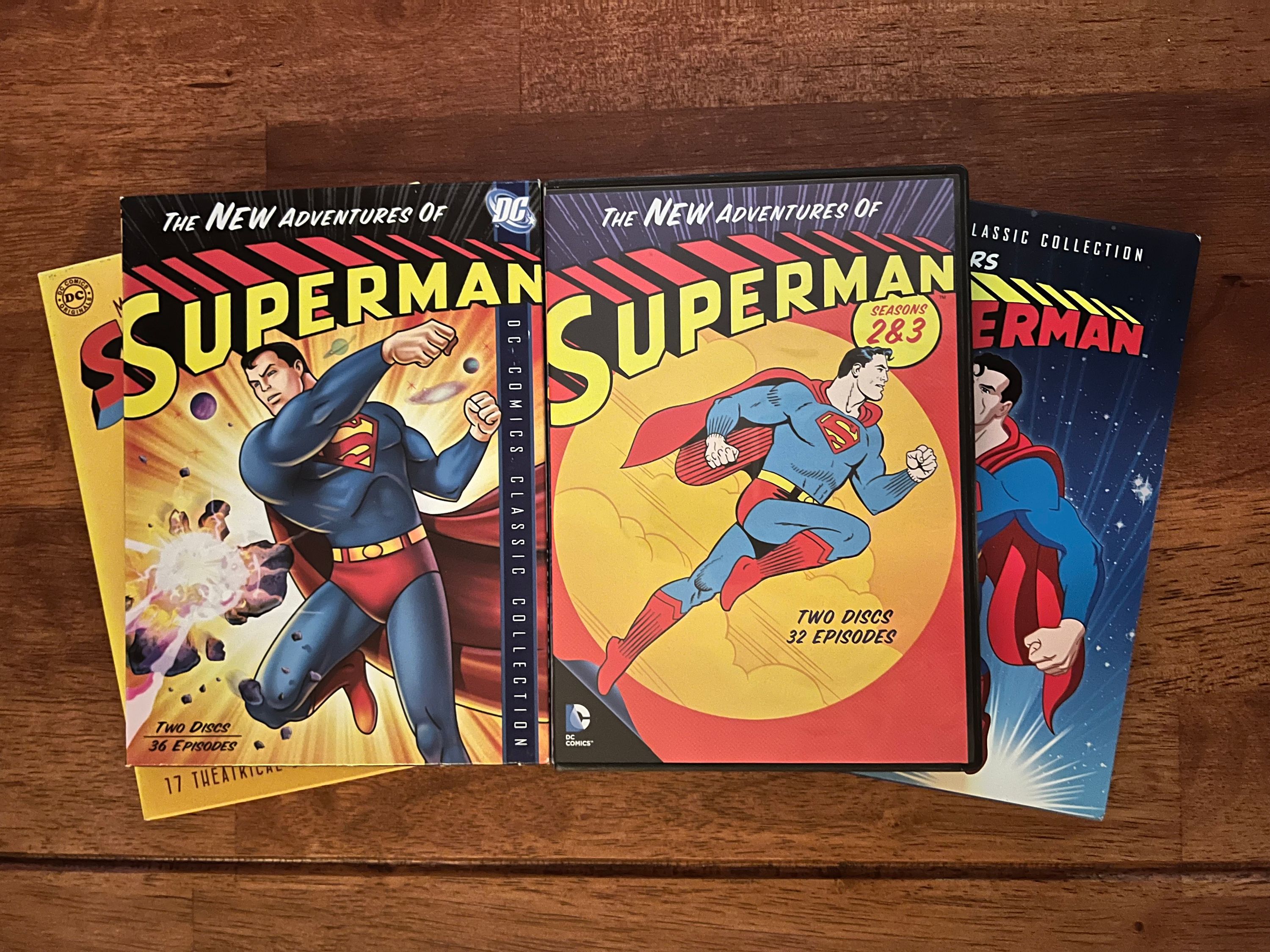 Covers for the DVD releases of various Superman cartoons with the filmation The New Adventures of Superma volumes one and two on top.