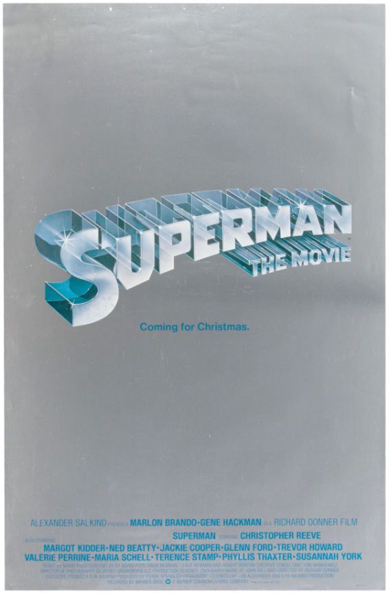 Mylar foil poster with the text Superman the Movie coming for Christmas.