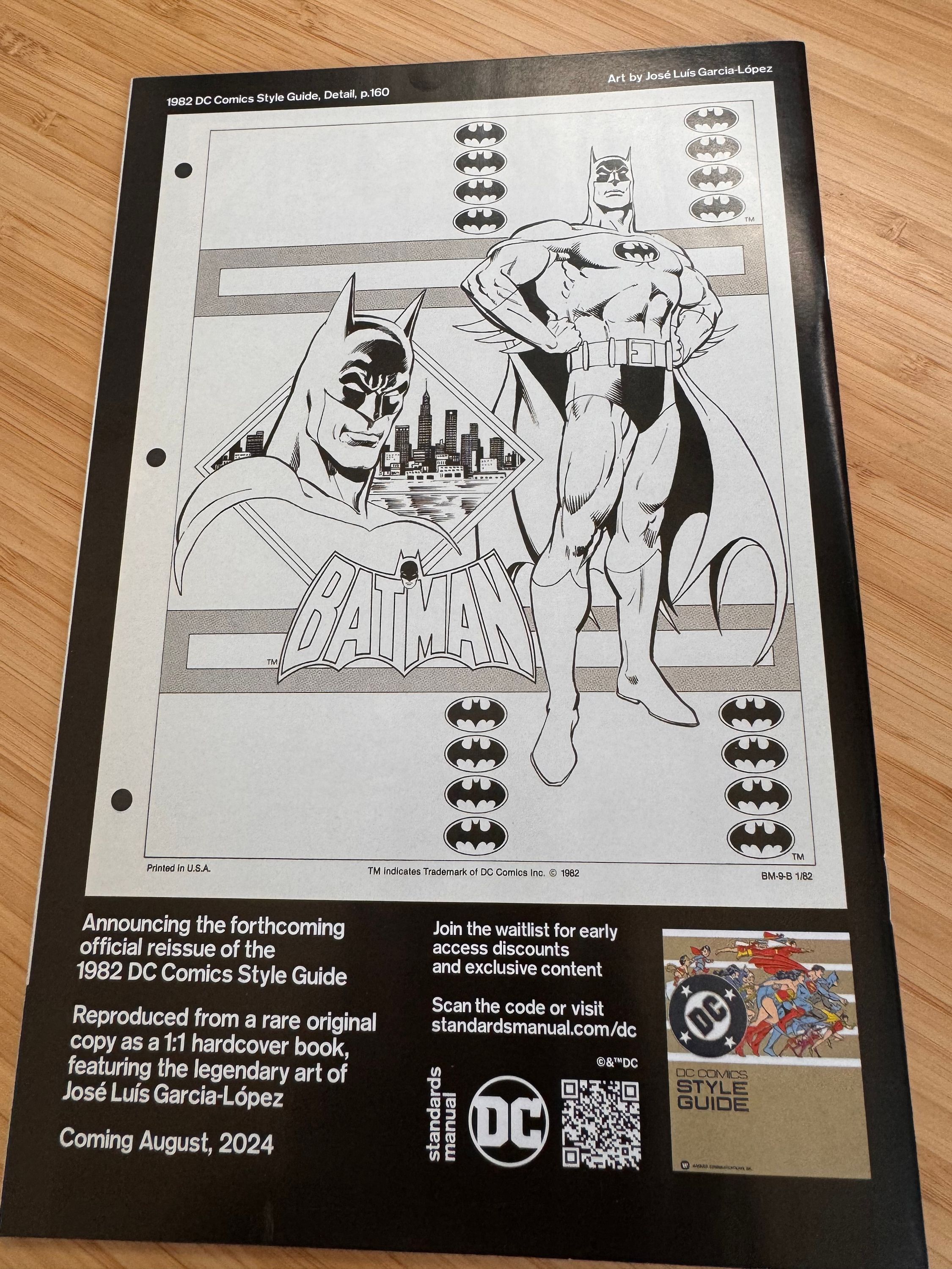 advertisement for the reissue of the 1982 DC Comics Style Guide. Featuring art by José Luís Garcia-López depicting Batman standing with his hands on his hips; plus a close up of Batman’s face. Multiple Batman logos and an old Batman wordmark.