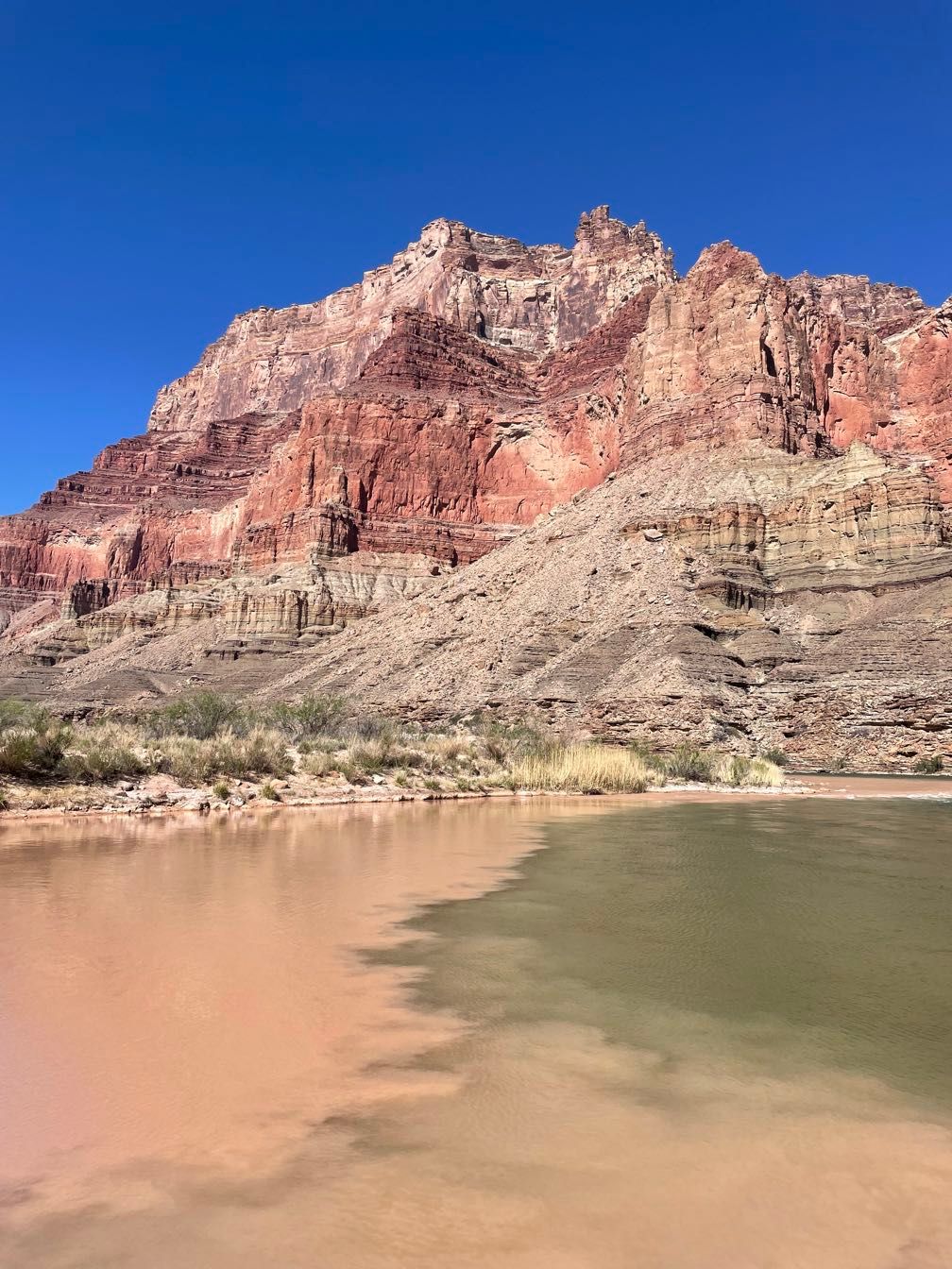 Muddy water of the Little Colorado flowing into the Colorado