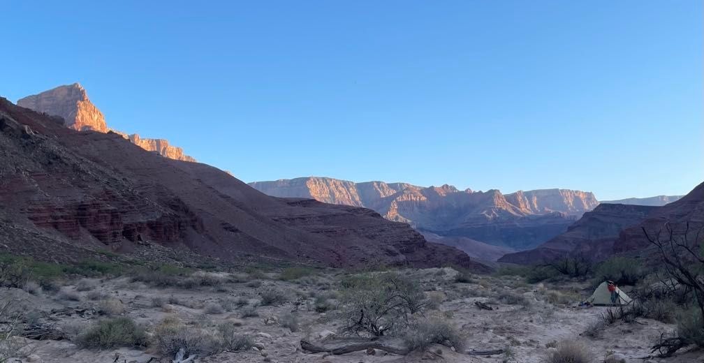 Evening light on distant cliffs