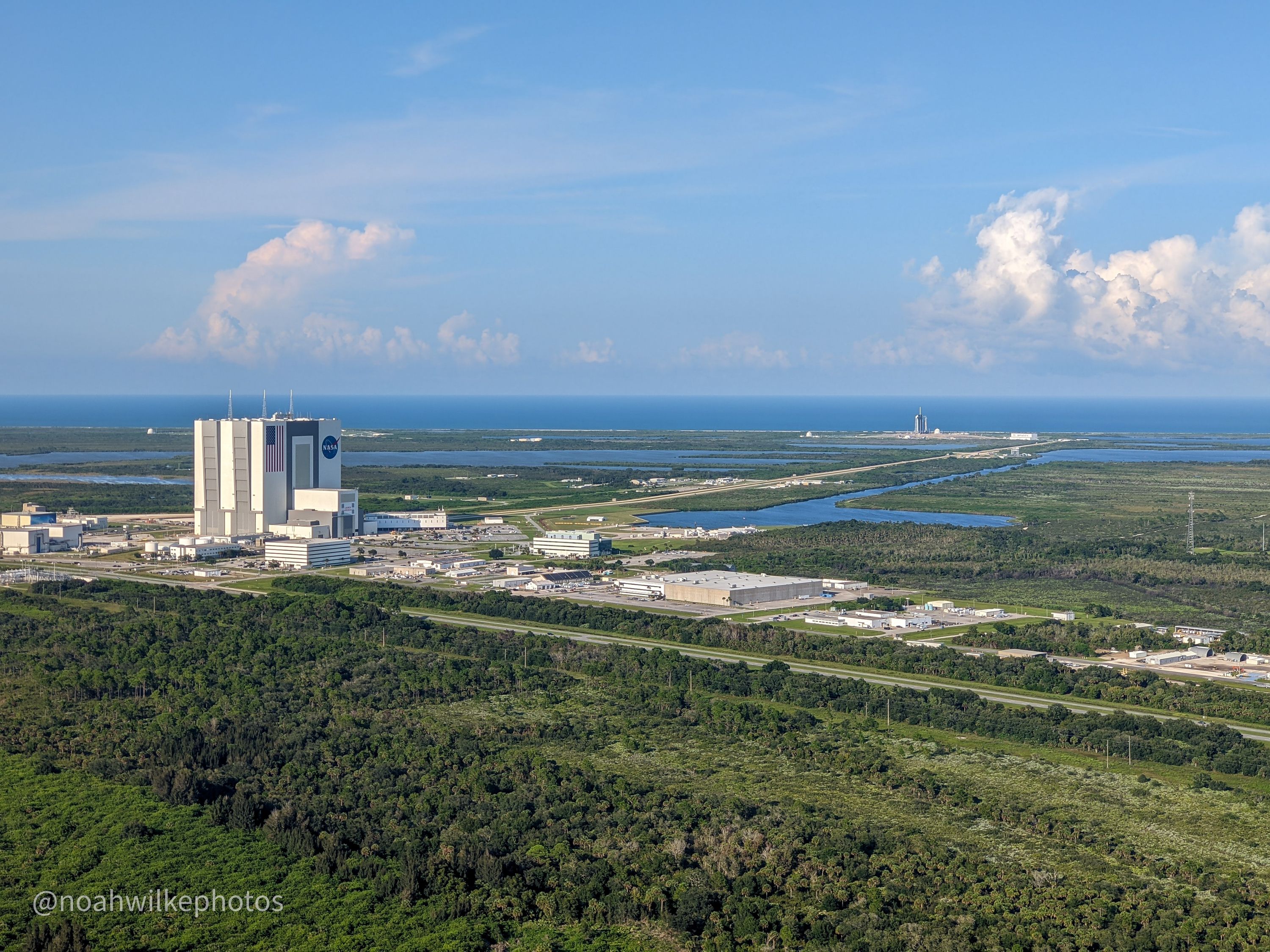 NASA's VAB and SpaceX Falcon 9 on the Launchpad