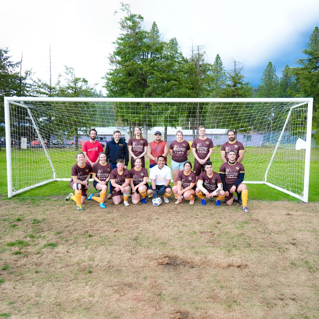 A group of people posing for a photo Description automatically generated