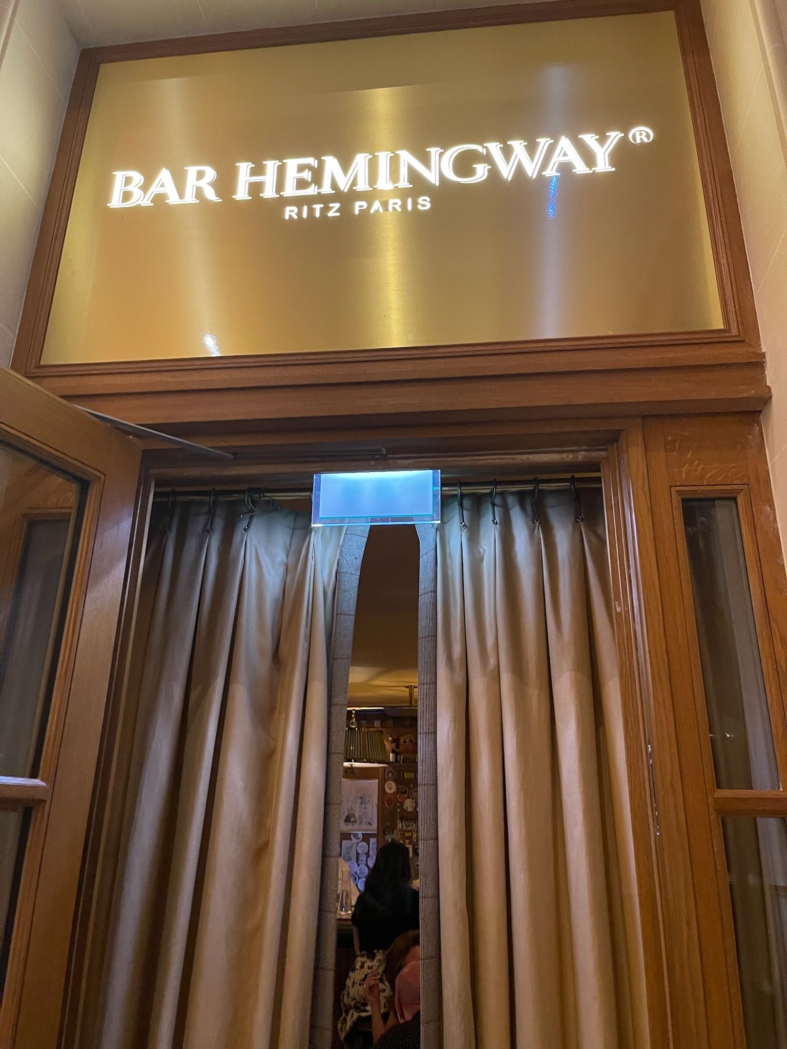 A sign above a doorway AI-generated content may be incorrect.