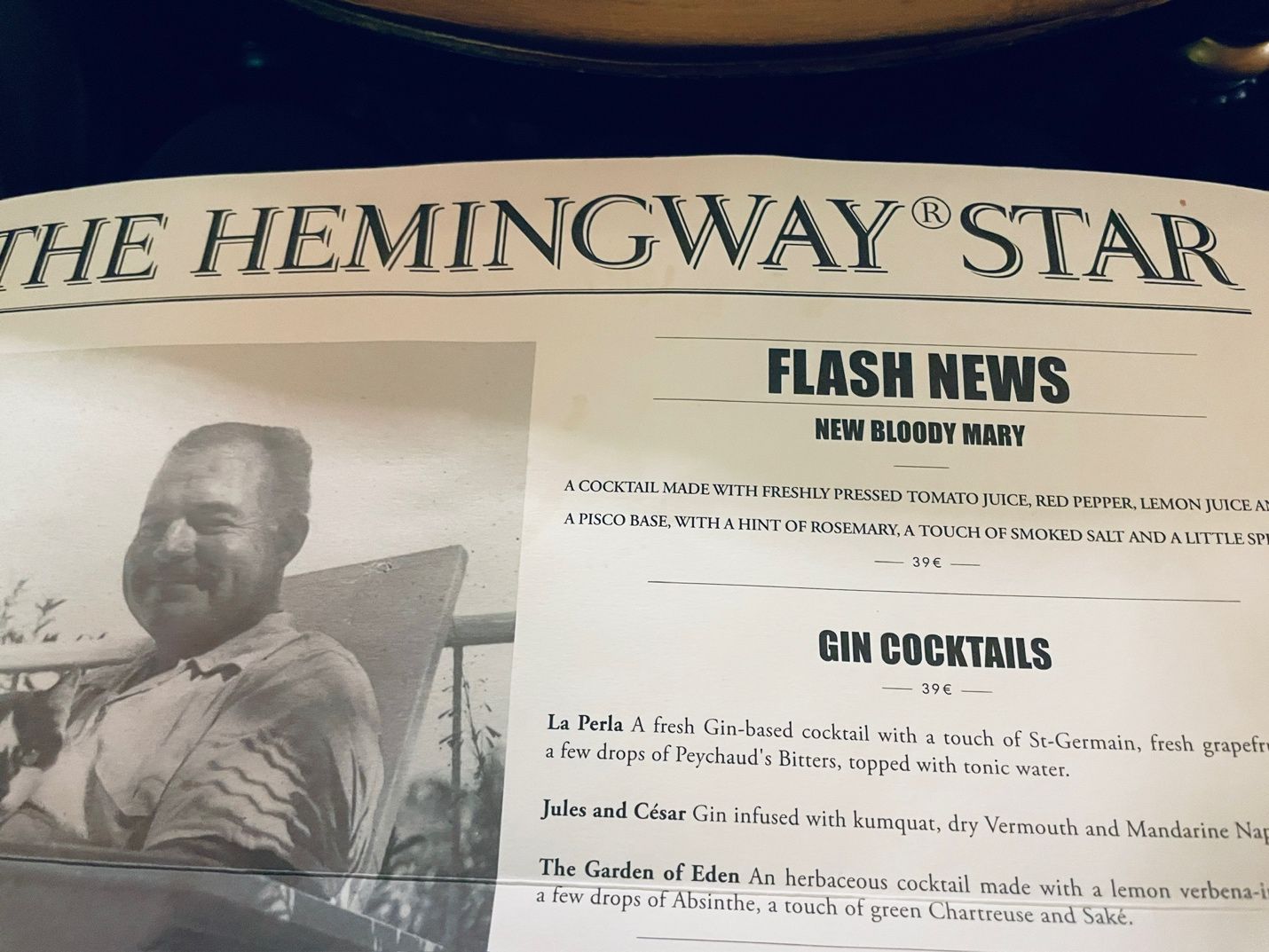 A newspaper with a person in a chair AI-generated content may be incorrect.