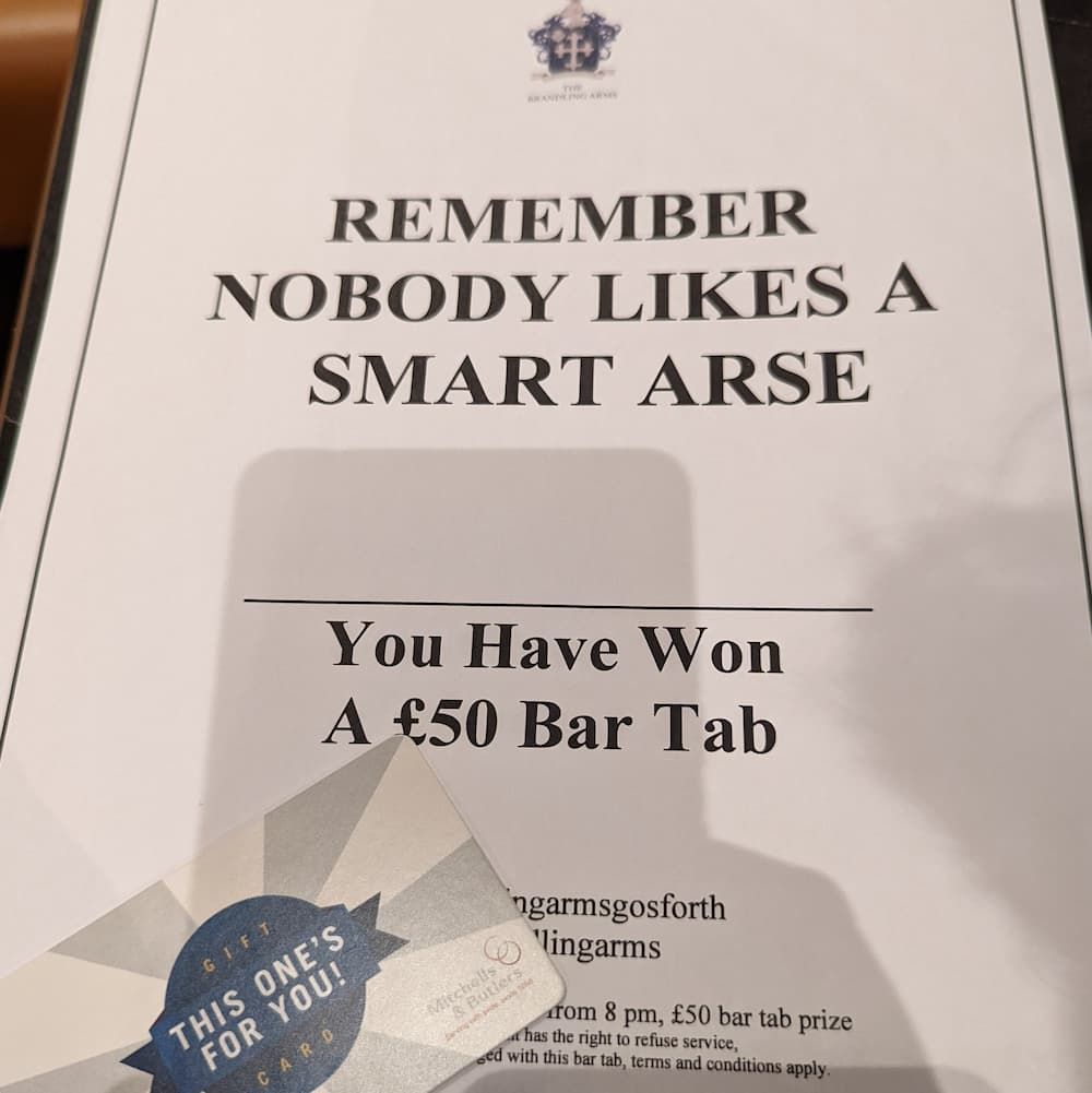 Pub quiz winners sheet with an important message: No-one likes a smart arse.