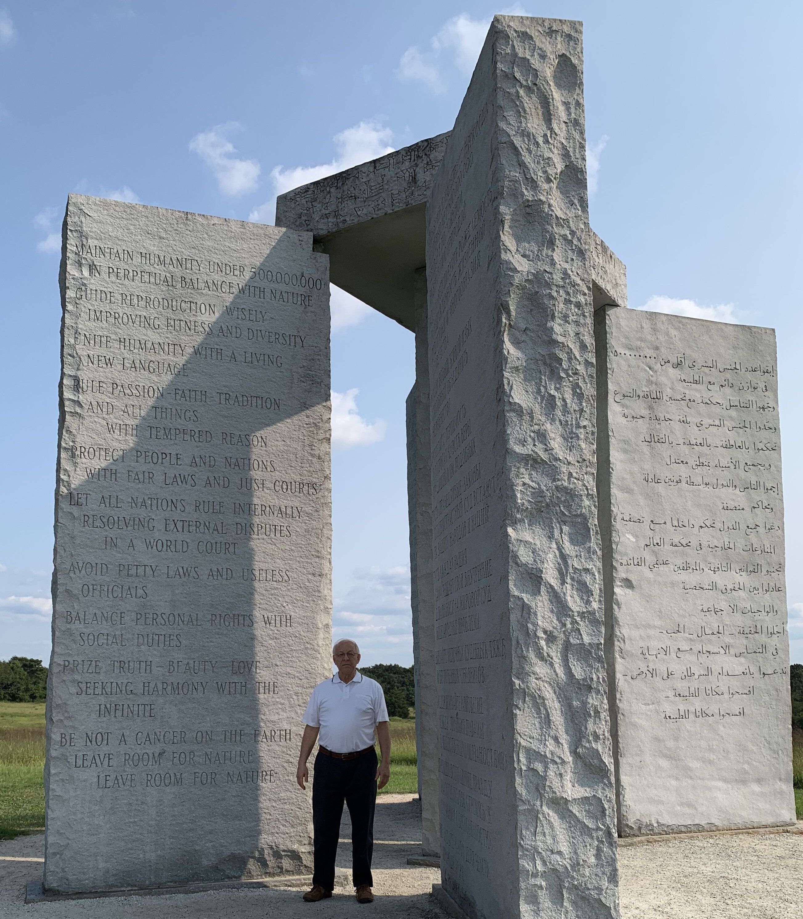 Dr. Bruggeman in front of the Guidestones in August, 2021