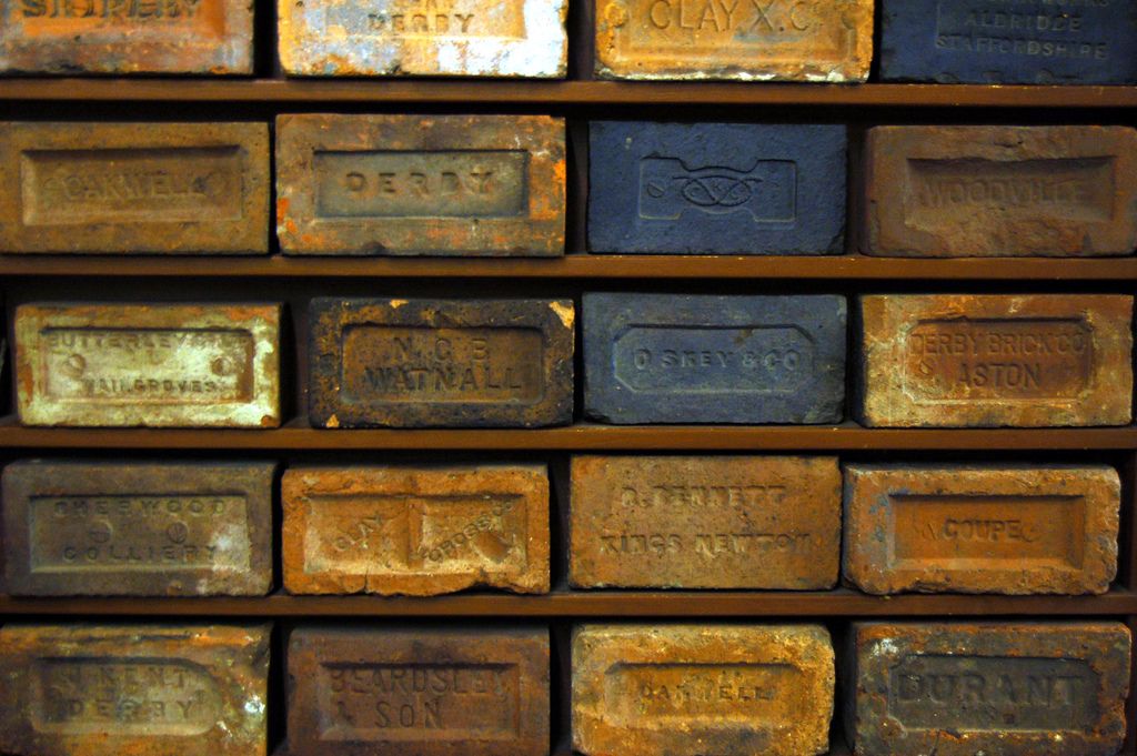 Collection of bricks showing manufacturers’ names from Derbyshire and surrounding counties.