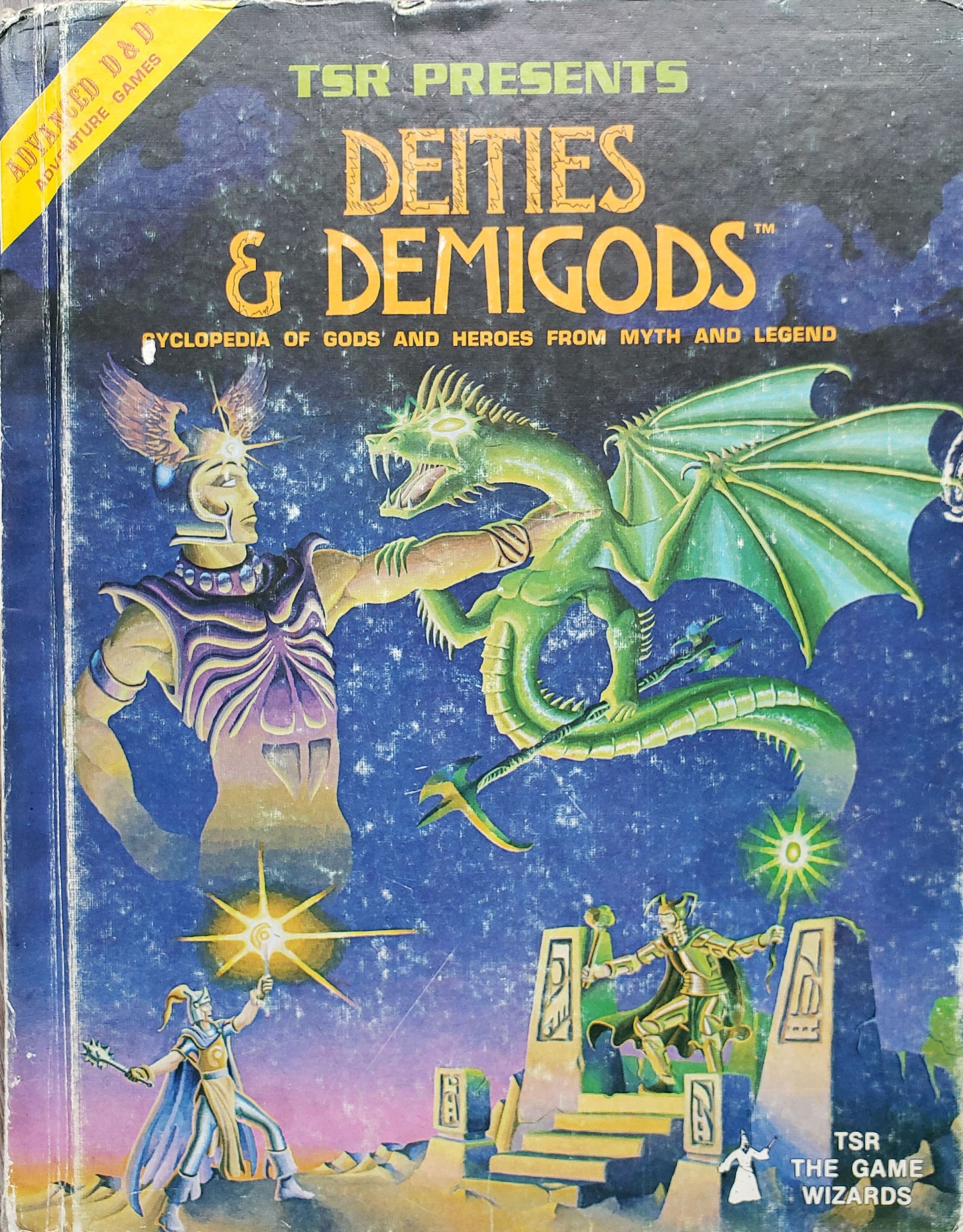 The front cover of a beaten copy of Deities & Demigods, with a dent on the top and wear along the spine and across the surface. There are some pen marks around the title.