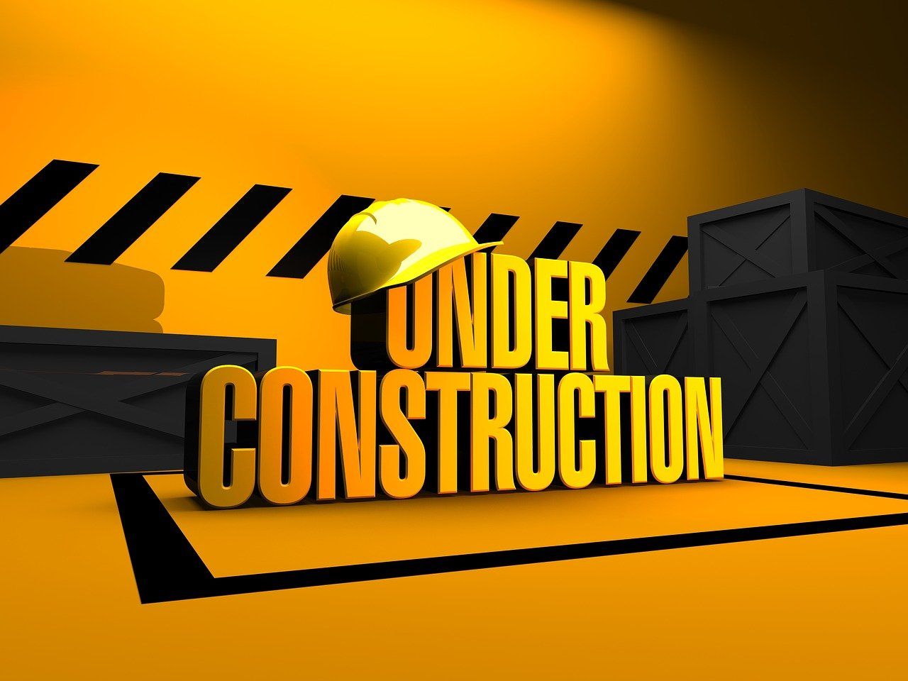 The 3-D words “UNDER CONSTRUCTION” appear in front of some crates in a large yellow space, with a giant yellow hard-had perched on top of the letters.