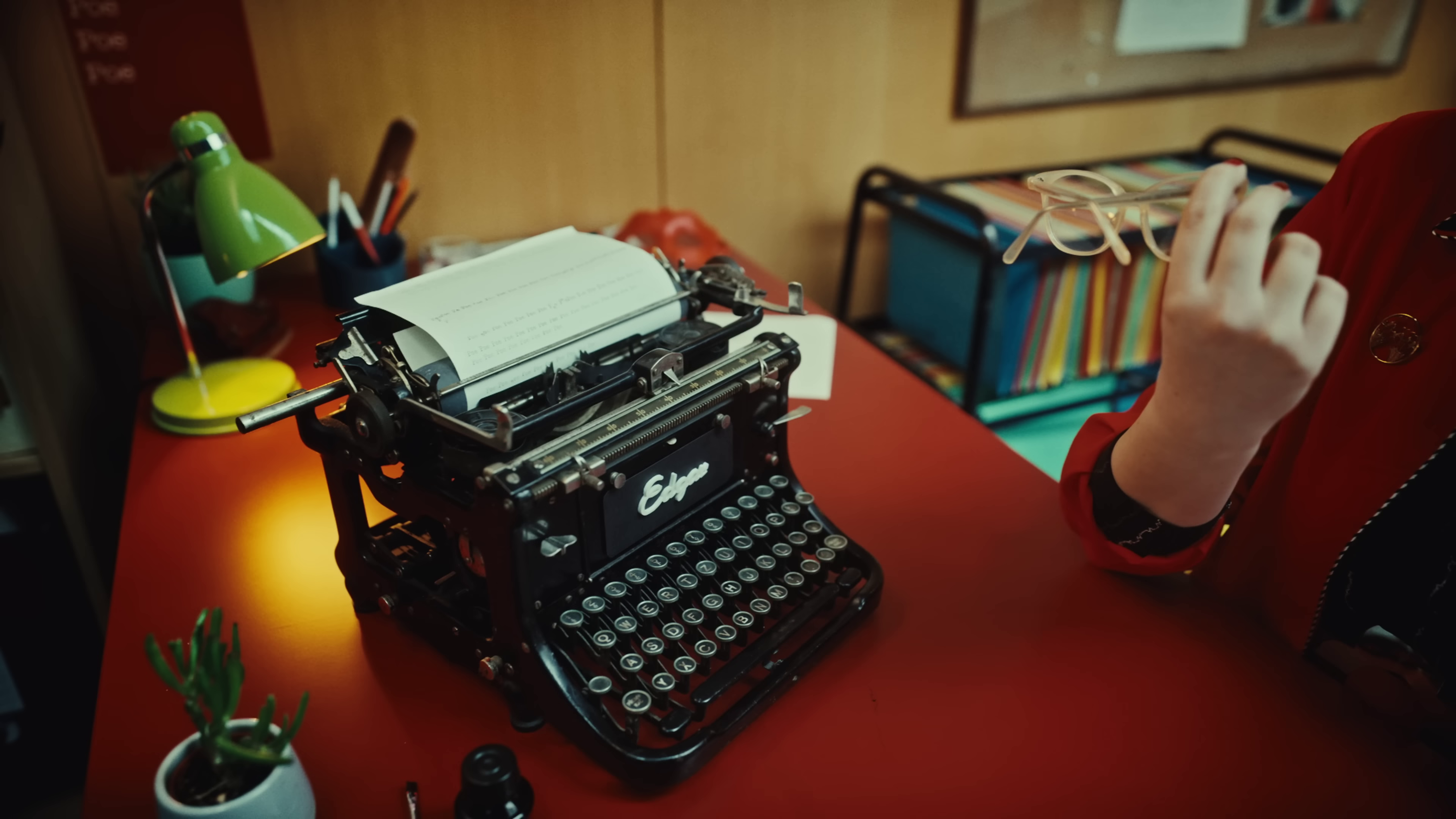 image of an old-fashioned typewriter with “Edgar” in script