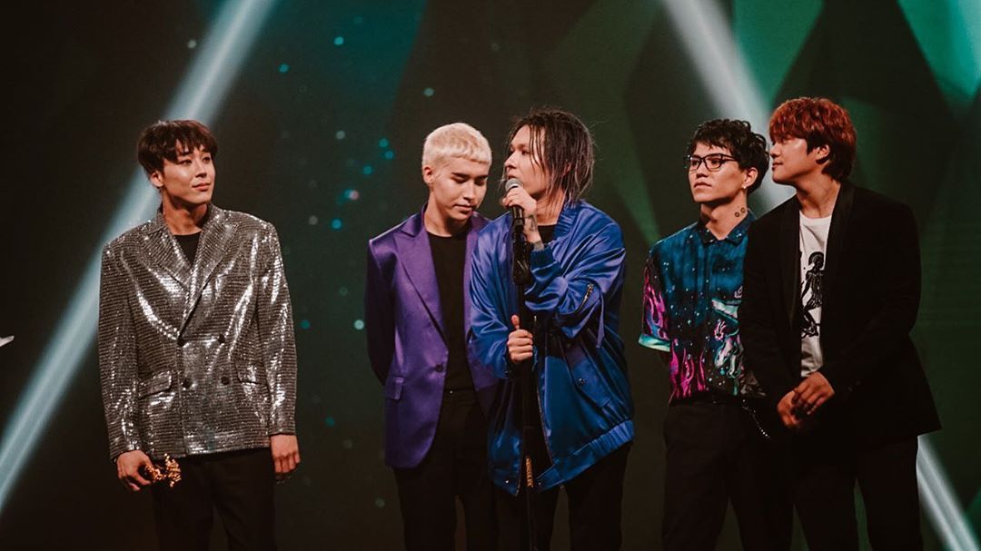 Picture of all five members of Ninety One at a concert in 2019