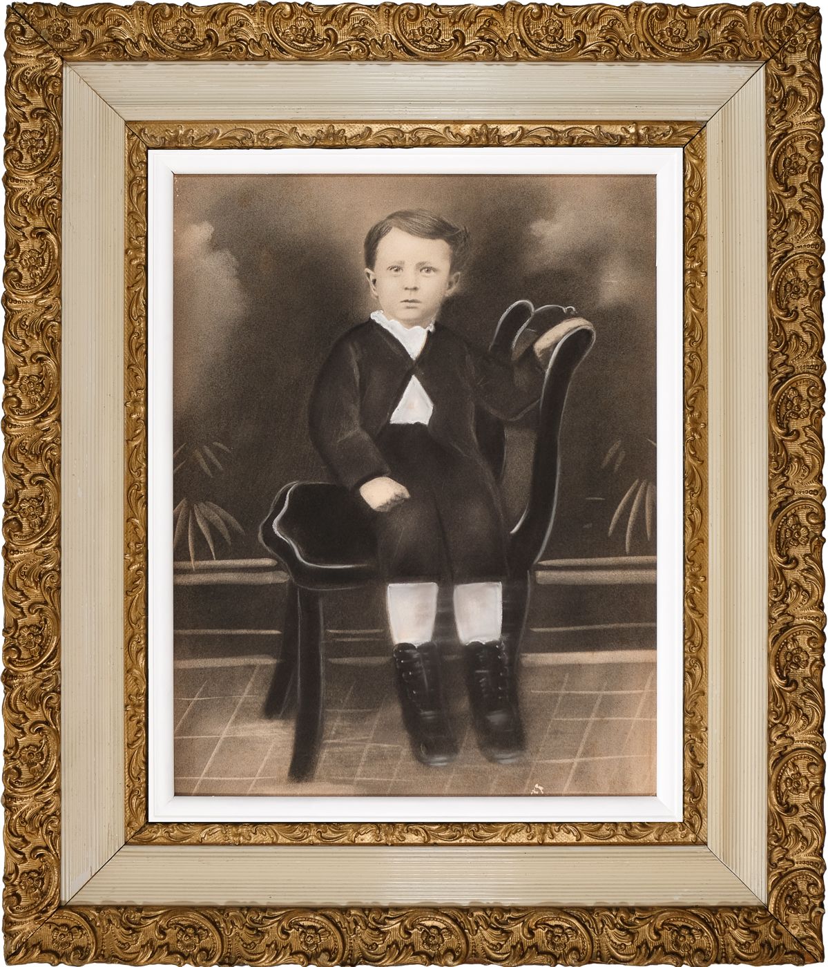 065 Boy in chair in ornate frame