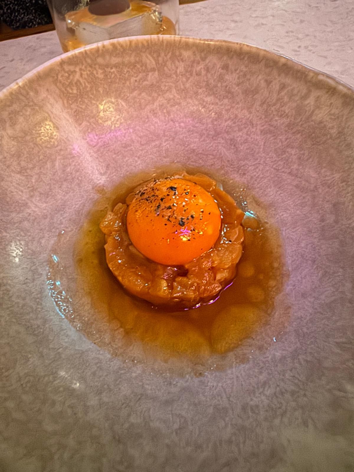 Trout tartare with egg yolk