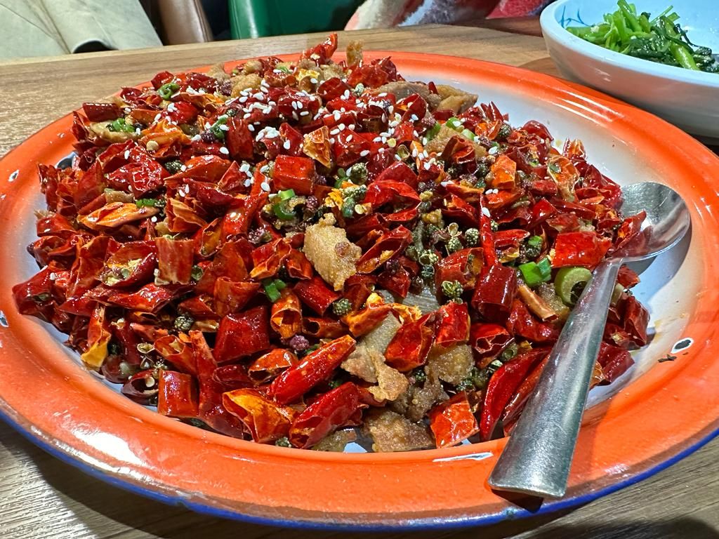 Fragrant chicken in a bed of chillis