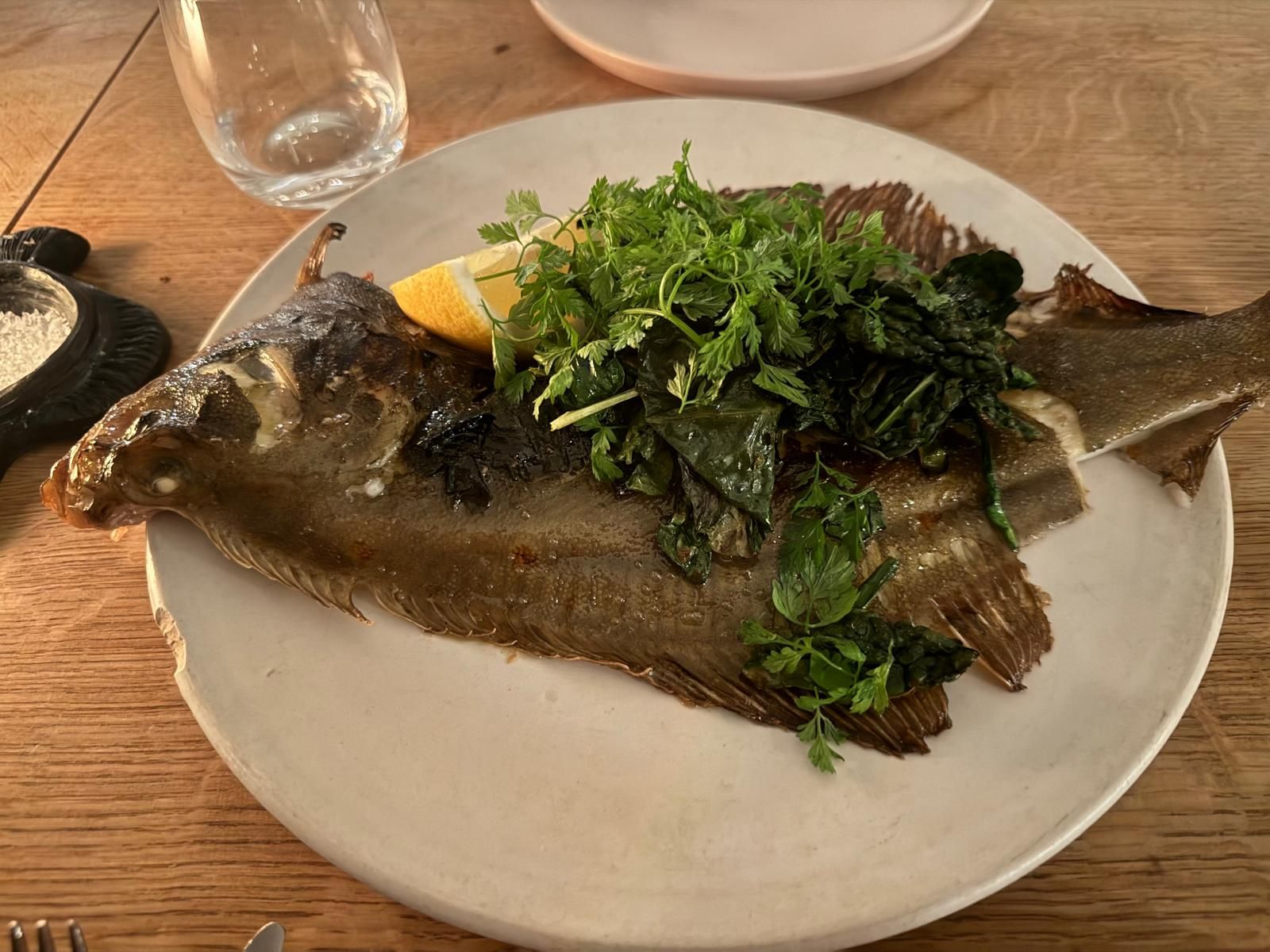 Whole plaice in nori butter and kale