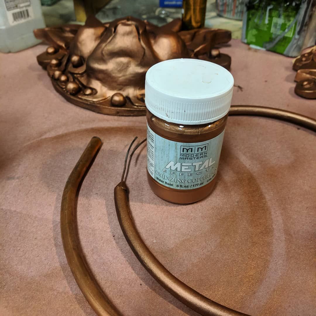 If your looking for some nice, airbrush-able metallic paint then you might want to try this modern Masters paint, not only does it look like the real deal(one if these items in the photo is actual copper) but it also is chemically reactive for patina and weathering. Pretty cool! And a decent price. wip propmaker propshop painting