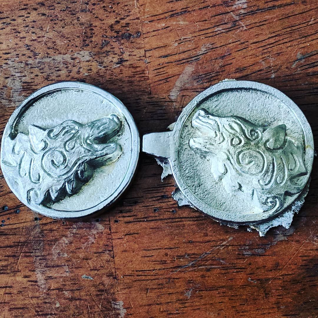 First cloak clasp pull from the mold! I’m not sure if I’ll melt it down and do another pass or not… Probably, it’s kinda heavy and I over filled the mold. At least, unlike resin, I can melt it down and do it again! pewter larp sculpture cloak