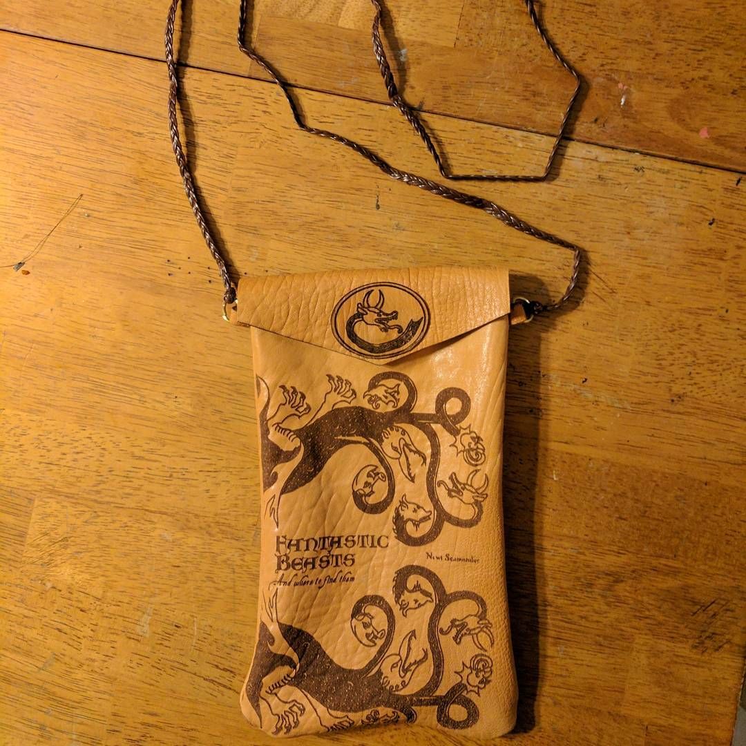 Check out this new leather bag that we just finished up for the store! Great as a purse or a tablet pouch or maybe to carry your magical components in? lasercutter laserart bag leatherwork harrypotter fantasticbeasts wizards geekbag geek pm if you’d like one, or we will have them in stock shortly.