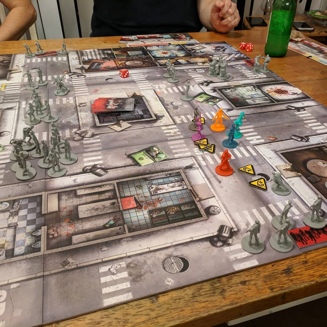 Things were looking pretty bleak here at this point! But we managed to escape, with the zombies on our heals! zombicide is a ton of fun, great co-op game! boardgames gamenight