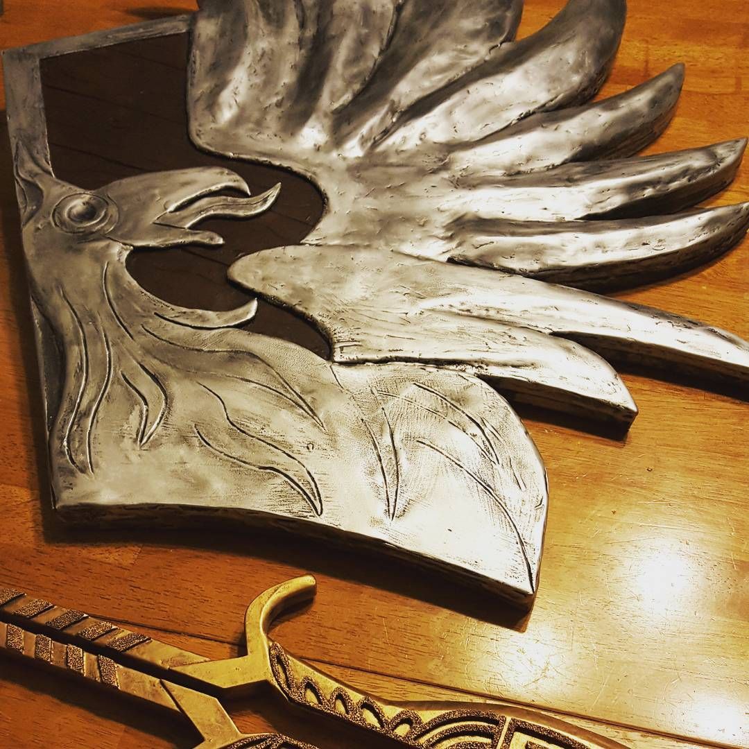 Done! Here’s my late night shot of the finished blackwall Griffin shield! I’m really excited about his well this turned out especially since this was a rocky road, mistakes were made! None the less I think I scraped through it and got something good out of it all!For those that want to know the details: I used 2x10mm eva foam from TntCosplaySupply and the Griffin is made using Worbla. The wood is finished with plasti-dip and the Griffin with Epsilon!dragonagecosplay dragonageinquisition