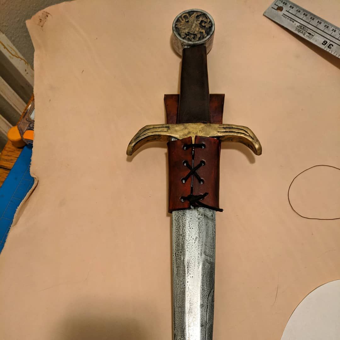 Look like leatherwork is going to be the theme for the first half of October! I made this dagger hanger to go with one of my Griffin daggers for a client. I like it so much I’m going to make a couple sword hangers like it for our Ranger gear! More leatherwork to come, I’m in the middle of making quivers, wip pics on the way soon!