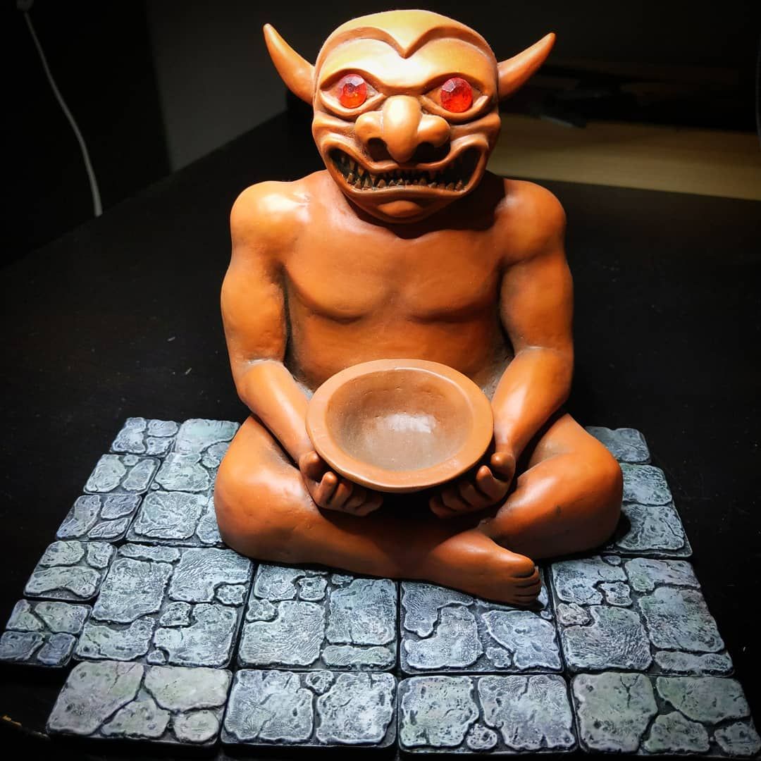 I started building my dungeon! lol Decided on a when to paint these resin dungeon tiles that I’ve had laying around for ever. They look really cool with my D&D deamon statue from the 2ed players hand book cover. Makes me want to finish out the entire scene… We’ve had these dungeon tile molds laying around from years ago and when ever we have waste resin it gets dumped into the little molds. That’s a lot of waste, and now we have hundreds of these things. Everyone seems to sell them but I was thinking of putting them in the store anyway. What do think?oldschooldnd dnd minitures dungeonsanddragons5e dungeonsanddragons tabletopgames rpg dungeonmaster