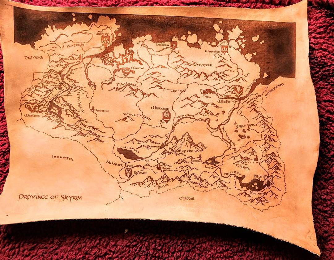 Leather map of skyrim ! This has been sitting on my laser waiting for me to clean and photograph it for over a week while I was sick. It was killing me lolI’ll be putting this up in the store shortly if anyone finds they need one of these as much as I did! map skyrim elderscrolls elderscrollsonline lasercutter replica prop videogameprops