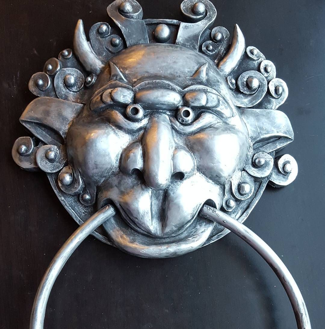 Right knocker looks pretty starkly in silver, no?labyrinth sculpture