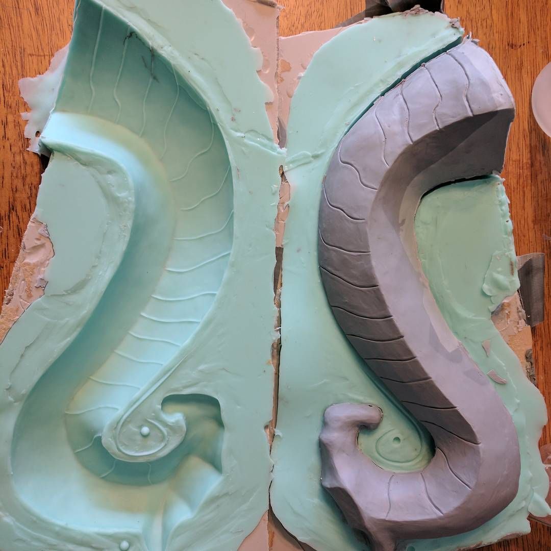 Progress! Well between being sick and lots of other work to do this project has taken an eternity but I finally got a cast of the dragon for the nord Street lamp done! This was honestly my worst mold ever and I’m shocked that my first pull produced something usable. Creating a decent mold in 5 minute intervals just leads to forgetting things all along the way, thankfully duct tape saves the day when you forget to add registration keys on half the mold! Smh, lol. Oh well, hacking again for the win!I used smoothon products as usual, rebound 40 to brush on and she’ll shock for the outside. I’d recommend Plasti-paste over she’ll shock if your doing something similar, it’s a bit better at this kind of application. moldmaking casting totalhackjob. **_Nordic_Lamp_Casting