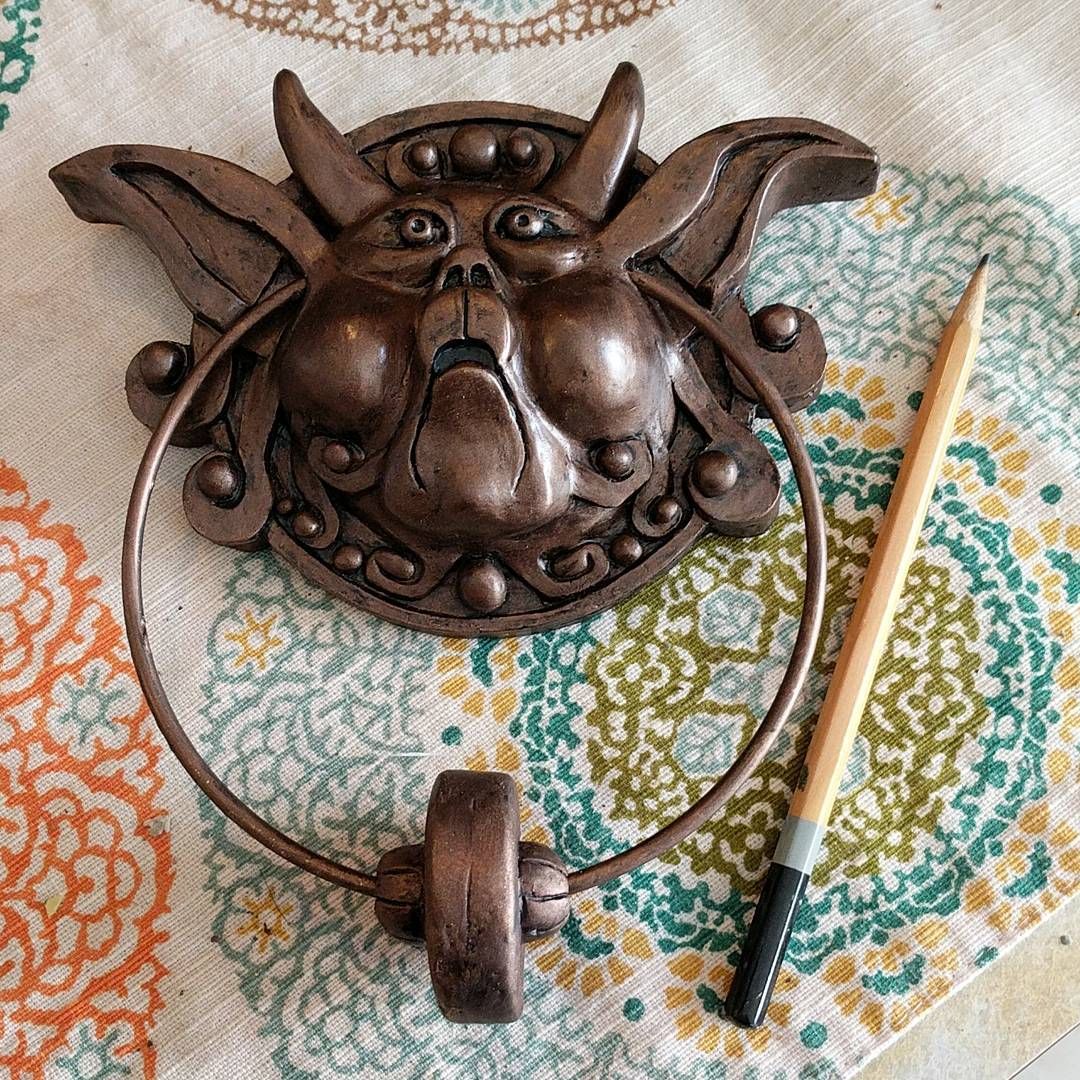Look at this little guy! Dang these mini knockers are cute! The other one is still awaiting the knocker ball paint to dry but he will be along shortly as well. Just about ready to make these guys for folks! labyrinth sculpture geek **_Mini_Knocker