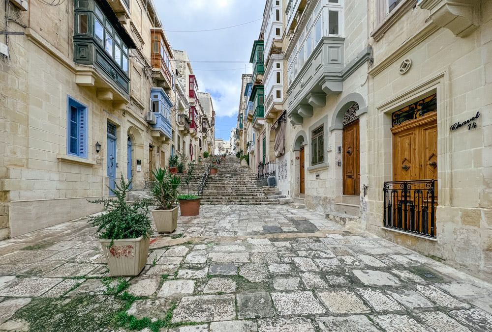 A street with boxy balconies